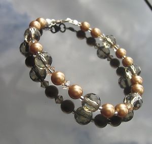 【送料無料】イタリアン　ブレスレット　ブレスレットスモーキークオーツスワロフスキーエレメントシルバーバックルbracciale quarzo fum 925 fibbia in argento realizzata con elementi swarovski e toho
